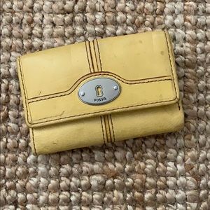 Bright yellow fossil trifold wallet